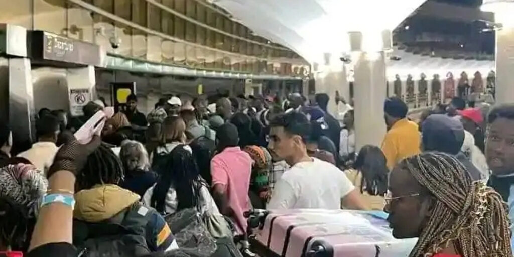 Image showing passengers stranded at JKIA Departures Entrance as Workers are on strike and unable to process boardings